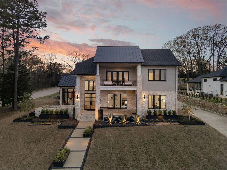 Welcome to an absolutely breathtaking custom-built luxury home just steps away from the serene Bellwood Lake. This 5-bedroom, 5.5-bathroom masterpiece spans 5,280 square feet and sits on nearly half an acre, offering privacy, elegance, and sophistication at every turn. The .93 acre lakeview lot directly behind this stunning home is also available for purchase with an acceptable offer. Soaring ceilings, oversized windows, and an open layout create a bright, welcoming atmosphere centered around an elevated living area with a floor-to-ceiling fireplace. The chef’s kitchen is built to impress with a large island, double ovens, built-in appliances, and plenty of room for entertaining. The primary suite feels like a private escape with a spa-style bath featuring a soaking tub, walk-in shower, dual vanities, and a custom closet. Upstairs, a versatile loft and private balcony offer additional space to relax or entertain. Step outside to enjoy a true backyard retreat—complete with a covered patio, outdoor kitchen and grill, fire pit, and a resort-style pool and spa. Additional highlights include a 3-car side-entry garage, smart home technology, and EV charging capability. Situated near Bellwood Lake with access to golf, dining, and community amenities, this home delivers the perfect balance of comfort, luxury, and convenience in one of Tyler’s most sought-after neighborhoods. Schedule your showing today!