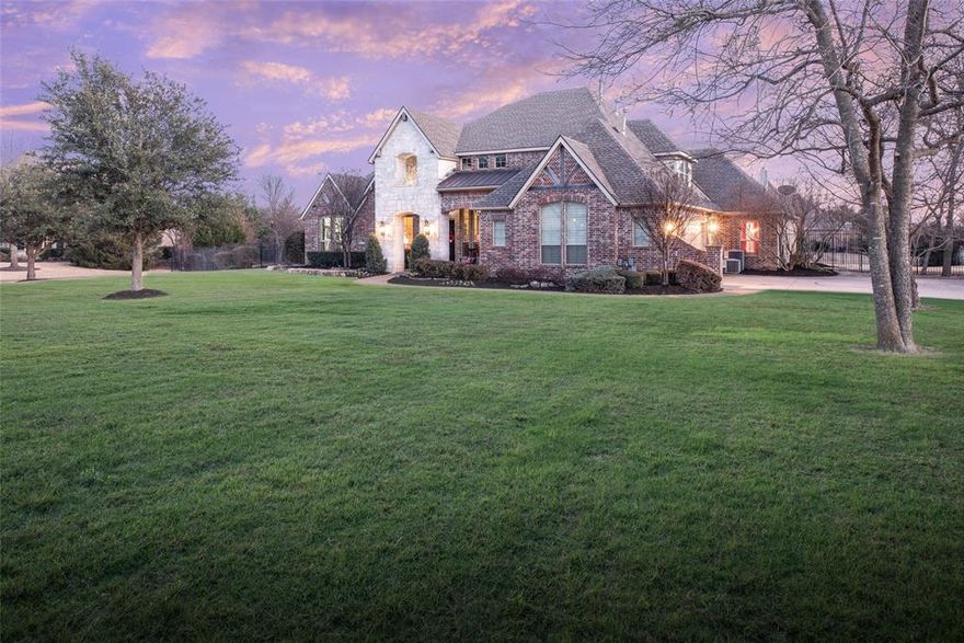Fabulous 1.5 story home in sought after Cimarron Estates, zoned to top rated Lovejoy ISD. Nestled on a lush 1 acre cul de sac lot, this 4 bedroom, 3.5 bath home offers an open concept layout with a stunning wood beam cathedral ceiling and expansive windows overlooking the backyard retreat. The chef's kitchen is built for entertaining with a gas cooktop, double ovens, 2 dishwashers, a large island, and an oversized pantry. A private study, downstairs game room, and spacious  upstairs media room provide flexible living for work and play. The serene primary suite, outdoor living with kitchen, and expansive backyard make this home perfect for gatherings. Complete with a 3 car garage and conveniently located near top schools, shopping, dining, and easy access to major highways, this home has it all.