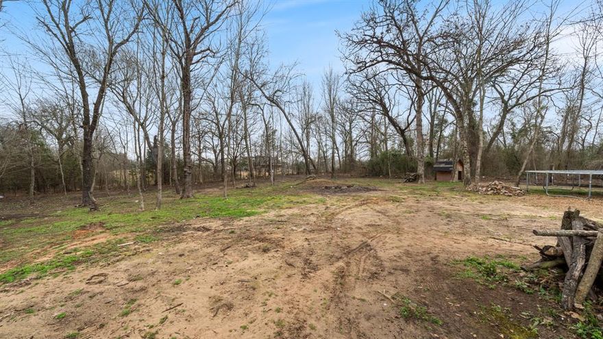 Featuring three combined lots with no known restrictions the survey offers a total of 1.82-acres. With unparalleled opportunity for development and expansion, this land provides ample space for a wide range of uses, all utilities on site and septic installed making it an ideal canvas for your vision. Whether you're looking to build your dream home, add to your rental portfolio, or invest in future growth for your family. Included in the sale are two 40-foot storage containers, a 1997 RV Rall MH, and a 2001 remodeled school bus, all offered as Non-Realty items. These versatile assets can serve as immediate storage solutions or temporary living quarters, providing added value and convenience. The seller is also open to Owner Financing and even removing these items should the buyer prefer a clear, unencumbered space.