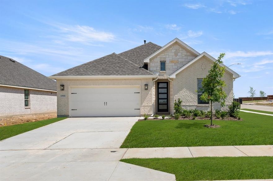 MLS# 21208727 - Built by HistoryMaker Homes - May 2026 completion! ~ Reduced pricing PLUS up to $50,000 to spend your way until 4-30! This stunning single-family residence in Liberty Crossing offers a perfect blend of modern design and traditional charm. With 2,187 square feet, the home features four spacious bedrooms, including a primary suite with a double vanity, and three full bathrooms, ideal for families. The open concept design includes a cozy living area and a dining space, seamlessly connected to a stylish kitchen complete with a kitchen island. Enjoy the convenience of a two-car garage and a covered patio, perfect for outdoor gatherings. Built on a slab foundation, this home is equipped with a heat pump for efficient heating and central air for cooling. The interior boasts a mix of carpet, ceramic tile, luxury vinyl plank, and tile throughout. Located in the sought-after Royse City ISD, with Walker Elementary, Ouida Baley Middle, and Royse City High School nearby. This property is currently under construction, with an estimated completion date of May 31, 2026.