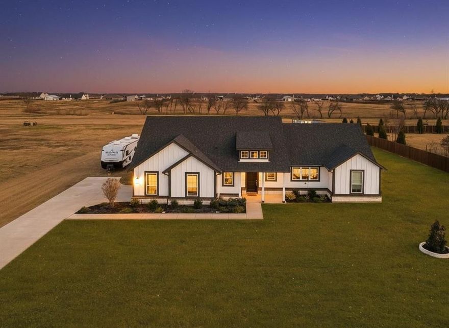 Set on a full 1-acre lot with no HOA, this stunning modern farmhouse-style home blends timeless charm with contemporary design. The striking white-and-black exterior delivers eye-catching curb appeal, while the thoughtfully designed open-concept floor plan creates a bright, airy living space perfect for everyday living and entertaining. Enjoy the covered patio ideal for relaxing evenings, gatherings. Come and build your own shop, pool, or whatever you desire. This one is agreat opportunity you don't want to miss!!