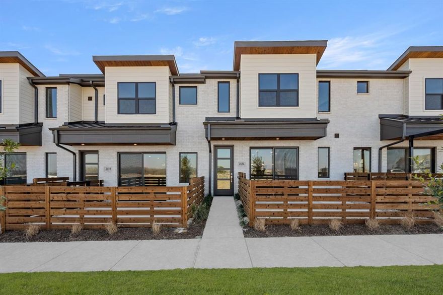 MLS# 21067225 - Built by Grenadier Investments - Ready Now! ~ March Move-In Madness: $25,000 in flex dollars—use it for additional discount, closing costs, or rate buy-down—PLUS a free Samsung refrigerator, washer, and dryer move-in package! Brand-new lock-and-leave luxury from Grenadier Homes in the sought-after Wildridge neighborhood. Three beds, two-and-a-half baths, 1,871 sq ft of smart-sized design with rear-entry two-car garage: open kitchens with quartz counters, stainless appliances, and seamless indoor-outdoor flow. Energy-efficient from the ground up—insulated tight, high-performance windows, efficient systems for lower bills and steady comfort. HOA takes care of exterior insurance, all maintenance, and yard care—so you never lift a finger. Welcoming fenced front courtyard, killer pond views with Lake Lewisville access. Just thirty minutes from Dallas—close enough for the buzz, far enough for quiet. Trails, pools, fishing—steps away. USDA zero-down ready: 100percent financing, minimum credit score 580, no PMI—so you move in with zero out-of-pocket. Come live easier. Price online includes March flex cash. Investors welcome.