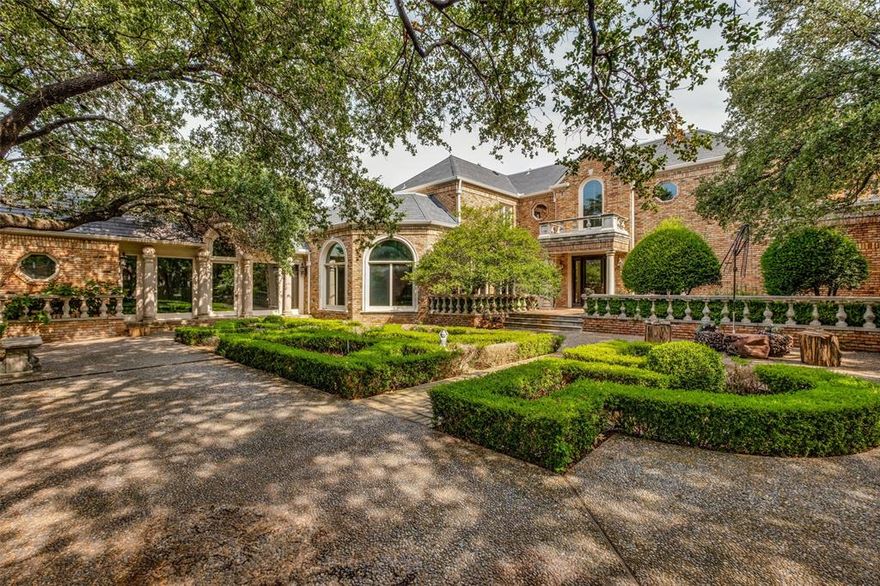 Live in luxury of Caruth Homeplace on a stunning-one of a kind lot. Enter the gated courtyard to the main house entrance & then enjoy the view through walls of floor to ceiling windows as the house wraps around it's treed private serenity. House sits at rear of community next to the fountain.
Floorplan is in online docs.