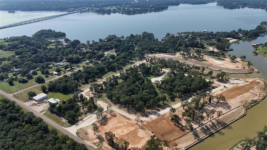 Welcome to Emerald Bay at Cedar Creek Lake! Where luxury meets natural serenity, Emerald Bay offers a remarkable community featuring only 71 exclusive homesites meticulously crafted across 44 stunning acres. Here, you can choose from both waterfront and interior homesite options, making it your chance to call this exceptional subdivision home—just over 1 hour east of downtown Dallas. Immerse yourself in a naturally inspired lake lifestyle at Emerald Bay, where your amenities embody the perfect intersection of nature and luxury. Life at Emerald Bay revolves around the refreshing waters of Cedar Creek Lake. LOT #35 ON 88' OF WATERFRONT! INQUIRE ABOUT SELLERS CONCESSION!

Amenities at Emerald Bay:
- Stunning Swimming Pool: Designed for leisure, the pool is perfect for swimming laps or lounging poolside, offering a peaceful retreat.
- Pickleball Courts: Stay active on our state-of-the-art pickleball courts.
- Basketball Courts: Shooting hoops at our well-maintained basketball courts.
- Playground: Designed for family fun and adventure. 
- Fire Pit: Enjoy cozy evenings around the fire pit, perfect for cooler nights while surrounded by the beauty of nature.
- Golf Cart Trails: Scenic golf cart paths throughout Emerald Bay, to navigate the community and connect with neighbors. 

This gated community boasts concrete roads, curb and gutter, underground utilities, street lighting, private water, private sewer, and fiber optic connections. With deed restrictions and architectural guidelines for builders, Emerald Bay is a roadmap to a luxurious lifestyle, offering both elegance and comfort. Emerald Bay is not only a stunning community but also conveniently located just a 10-minute drive away from the prestigious Pinnacle Golf Club. This 18-hole championship golf course has been voted the 8th best in Texas, making it a premier destination for golf enthusiasts.  
Being so close to Pinnacle Golf Club adds an exceptional layer to the Emerald Bay lifestyle.