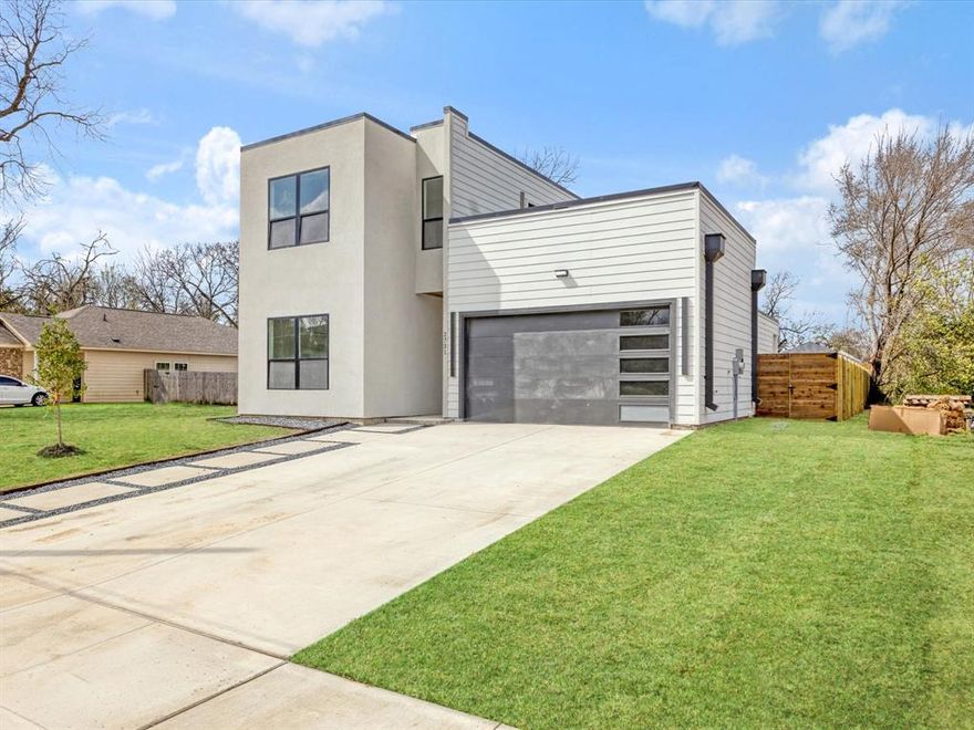 Step into modern luxury at 2731 Marburg Street, a stunning residence perfectly positioned just 10 minutes from Downtown Dallas. This masterfully designed 4-bedroom, 3-bathroom home greets you with soaring 20-foot ceilings, creating a grand, light-filled atmosphere that defines contemporary urban living in 2026.
The heart of the home is a chef-inspired kitchen featuring a massive statement island, sleek cabinetry, and high-end finishes, fully equipped with a modern refrigerator, electric cooktop, and professional vent hood. Relax in the open-concept living area by the glow of a stylish electric fireplace, or retreat to the first-floor in-law suite, offering privacy and convenience for guests or multi-generational families.
Elevate your entertaining on the expansive rooftop deck, the perfect lounge for hosting friends with views of the surrounding neighborhood. For everyday ease, this move-in-ready home includes an in-unit washer and dryer. Outside, the huge backyard offers a rare urban oasis on a generous lot, providing endless possibilities for outdoor living and recreation. Whether you are looking for a sophisticated sanctuary or a home that supports a vibrant lifestyle, this property delivers unparalleled comfort and style in the heart of Dallas.