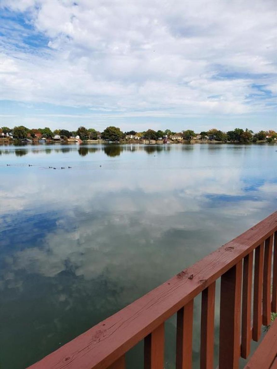 Lake View single story  Home in Irving,3 bed,2 bath,2 car garage and an office room(study) with lake view,laminated wood floor in living area.