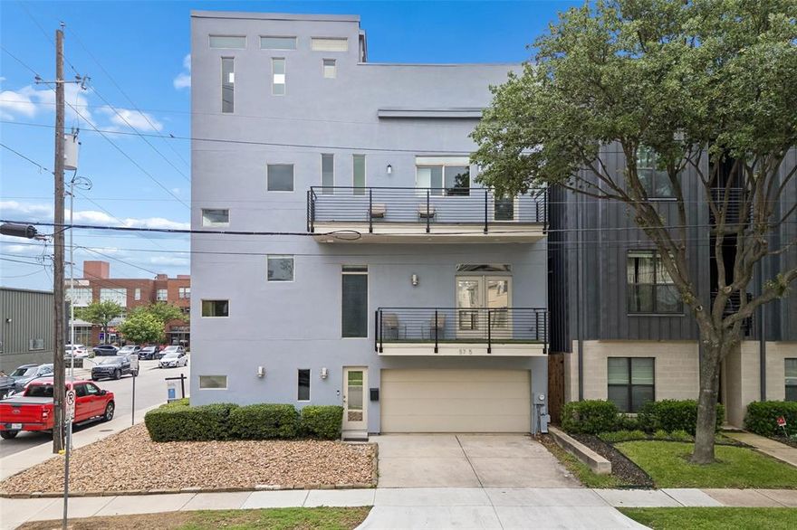 Ideally situated near the beloved Trader Joe’s in the dynamic Lower Greenville district, this sophisticated end-unit townhome offers an exceptional blend of modern luxury and urban convenience—with the rare advantage of no HOA fees! Thoughtfully designed for both refined entertaining and everyday living, the home features three generously proportioned bedrooms, each with its own ensuite bath, in addition to a stylish powder room for guests.  The expansive primary suite serves as a private retreat, complete with a turfed balcony, dual vanities, a soaking tub, a separate glass-enclosed shower, and two spacious walk-in closets. At the heart of the home, the gourmet kitchen is appointed with stainless steel appliances and seamlessly flows into a light-filled living area enhanced by a wet bar and an additional turfed balcony.  Crowning the property is an impressive 36’ x 21’ rooftop terrace with covered access—an extraordinary setting for entertaining or quiet evenings, all while taking in sweeping views of the Downtown Dallas skyline and the vibrant neighborhood below. A two-car garage, complemented by a two-car driveway, and a full-size utility closet further elevate the home’s functionality.  With rare walkability and close proximity to White Rock Lake, Southern Methodist University, and Downtown, this residence captures the essence of elevated Dallas living and offers unrivaled access to the best dining, shopping, and nightlife in the city.