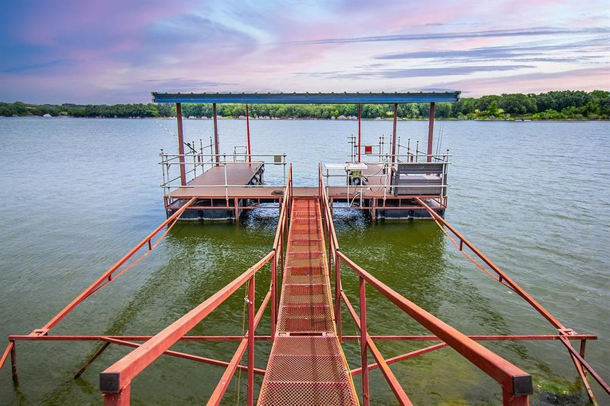 At Brady Lake in the Heart of Texas, this property stands in a category of its own. Sprawled upon two lots, it offers lake country charm, utility, and a layout thoughtfully designed to make the most of lake living without compromise including an amazing private dock.

The home has two bedrooms and two bathrooms, arranged for comfort and easy flow. The kitchen has been completely updated with custom wood cabinetry, striking countertops, and upgraded appliances for style the lovely center of the home.  There is a welcoming living room and dedicated dining room, and entry or mudroom with no shortage of storage and care. 

Step outside and the property really opens up with a  a covered outdoor kitchen on concrete slab, ideal for gathering and cooking year-round, a nice shop for projects or storage, an oversized carport with room for taller vehicles, a great back deck off the back door, a she-shed, and a fall-out large storm shelter.  It truly has every improvement once could desire. 
Down by the water, a private well built boat dock makes getting on the lake simple, with strong steel ramp, composite decking for comfortable barefoot walking and long lasting durability, fish cleaning station, and electricity. 


This is a rare setup for Brady Lake, two lots, multiple functional structures, and direct water access—all brought to market at a price designed to move. Interest is expected to be strong, and for good reason.