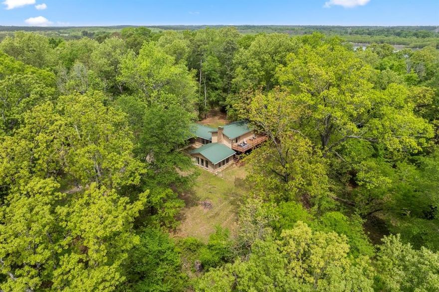 Set on nearly 5 private acres just minutes from Lake Bob Sandlin and the boat ramp, this 3-bedroom, 2-bath home offers a rare blend of space, serenity, and lake-life living. Ideal as a second home or peaceful retreat, the property is designed for quiet escapes, open skies, and easy access to boating, fishing, and outdoor recreation.

With generous acreage for outdoor living, future enhancements, or personal customization, the property also offers short-term rental potential, making it an attractive option for buyers seeking both lifestyle and investment value. Whether enjoyed as a weekend getaway, vacation home, or income-producing retreat, this property delivers privacy, flexibility, and timeless appeal in a highly desirable lake-area setting.