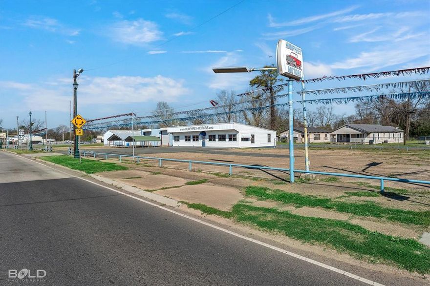 Prime Commercial Property – 1.01 Acres (2 Parcels) with 3 Buildings
High-Traffic Corner Location on E Texas St – Formerly Humphrey Motors
Excellent opportunity for auto sales, industrial, or mixed-use operations. This well-established location offers high visibility and accessibility with ample space for business growth.
Property Highlights:
Total Lot Size: 1.01 acres (two parcels)
Vehicle Capacity: Lot accommodates up to 124 cars
Buildings On-Site:
Office Building:
3 sales offices
Customer waiting area
Staff kitchen and restroom
2 public restrooms
Back office with pay window
Owner's office with private entrance
Shop 1 (50’ x 45’):
3 bays (2 front-facing with carports – ideal for detailing)
Rear bay for storage or miscellaneous use
Shop 2 (72’ x 43’):
Large roll-up doors
Suitable for mechanical work or versatile industrial use
Additional Features:
Corner lot with heavy traffic exposure
Flexible layout for a variety of commercial or industrial operations
Furnishings included in sale (note: some reserved items)
Ideal for auto dealers, mechanics, or investors seeking a functional site in a strategic location.
Lots of options and use - Corner location and tons of traffic. Furnishings included in sale - reserved items note.
