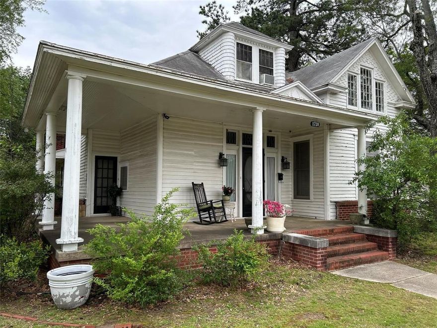 Late 1800's Victorian Home in Beautiful Paris Texas.  This multi-purpose property features 3 bedrooms, 3 bathrooms, 2 living areas with fireplaces.  The charming oval glass door leads to an elegant entry with a beautiful staircase. Large open den, kitchen and breakfast area wonderful for entertaining.  This property features a 2 car garage with 700 sq ft apartment above that needs a total renovation with make a great Air B&B.  House has had some updating and has been occupied in the last year for several years.  Property is zone Residential Commercial.
