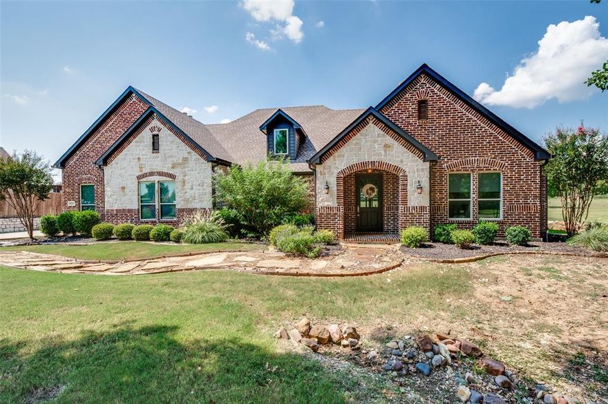 Welcome to this immaculate 3 bedroom 2.5 bath custom built home with private home office built in 2017.  This is one of the newest built homes in prestigious Hidden Lakes Ranch.  Move-in ready.  Outside the city limits, no city taxes.  Gunter ISD.  This home has it all. Ten foot ceilings, hand-scraped wood floors throughout, frest paint, wired for security, double oven, Bosch appliances, tankless water heater, sprinkler system front and back yard, propane, solid wood doors, spray foam insulation, so much built in storage, Tesla charger, insulated garage doors, wood burning fireplace with propane starter.  Do not miss your opportunity to own this beauty.  Schedule your showing today to see for yourself.