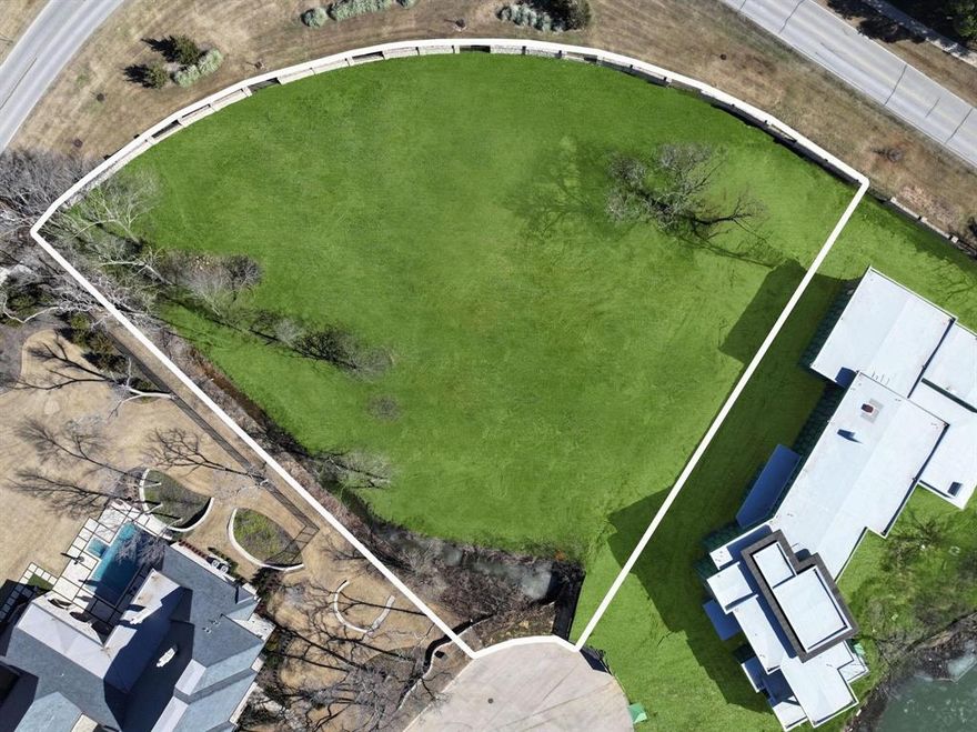 Discover the perfect canvas for your dream home on this enchanting 1.79-acre lot in the exclusive Quail Hollow neighborhood. Choose your own approved builder and create a haven of luxury living. Tucked away on a serene cul-de-sac, this property provides seamless access to 114, DFW airport, and premier shopping, while also boasting proximity to the prestigious Vaquero County Club just across the street. Immerse yourself in the natural beauty of 188 acres adorned with rolling hills and mature trees, all within the secure embrace of Quail Hollow—a 24-hour guarded and gated luxury community in one of North Texas's most sought-after locations. Option to enroll in either the International Baccalaureate Westlake Academy or CISD. Your ideal home begins here.