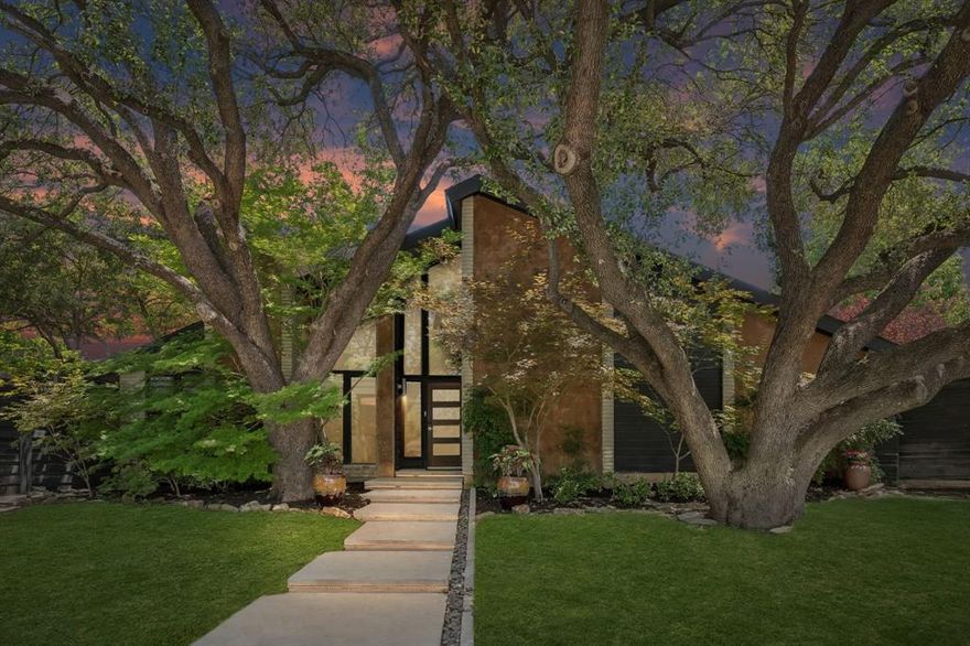 OPEN HOUSE SUN, May 24th from 1-3pm.  15 miles north of downtown Dallas, find this stunning soft contemporary with a dramatic entry, nestled under a canopy of mature trees! Zoned to coveted Brentfield Elementary, part of Richardson ISD. Built in 1978 on a .33 acre lot, you'll find an expansive yard space, pool, workshop, & amazing outdoor patio. Laid out perfectly on one level, the home has two large living rooms with towering ceilings on either side of the home, centered by a chef's kitchen. Warm wood accents give authentic character along with unique lighting in many facets of the home. Sizable kitchen features Bosch appliances, including a 5-burner gas range. A long sunroom splits the kitchen and patio, creating wonderful views outward towards the pool scene. A true entertainer's dream awaits on the covered patio, with an outdoor fireplace, gas grill, mini fridge, & large sitting area. Pool built circa 2013 has a hot tub & waterfall feature. All this alongside a sizable yard, encompassed by a wooden privacy fence & Viking sliding gate. The 2-level garage has a Versa Lift & full workshop. Be worry-free in the event of a power outage, as you'll find comfort in the whole-house Kohler Generator! Loaded with extras, this home will not disappoint. 22 mins to DFW Airport & located near several major thoroughfares. Just .5 mile south is a hot new development, Hillcrest Village Green. Don't miss out!