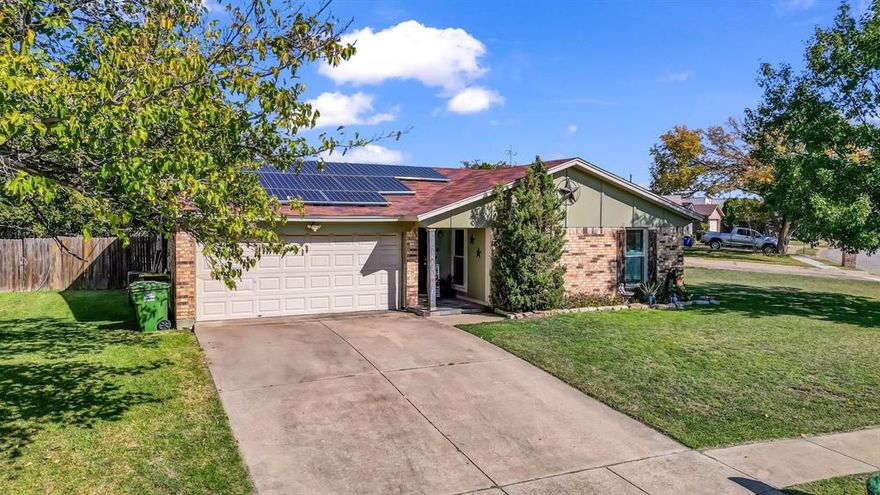 This great starter or downsized home, located in the highly sought-after Birdville ISD, is move-in ready and blends comfort, value, and a prime location. It's ready for its next owner to enjoy! The property features a 2-car attached garage, easy access to parks, shopping, dining, and is situated in an established neighborhood. For your maintenance peace of mind there is a lifetime transferable warranty on the foundation, all the windows were replaced in 2020 with double-hung, more energy efficient glass, and the HVAC was replaced in 2023. The corner lot allows for a landscaped look, but not the time-consuming headache of weekends of yard work. Solar panels are leased; the seller will pay off the lease at closing. Seller is in contact with the solar panel company.