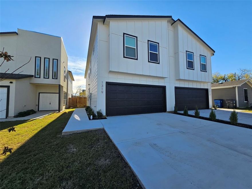 Introducing the BRAND NEW BUILD!! Located in the vibrant city of Dallas, TX, this stunning 3-bedroom, 2.5-bathroom, 2-story duplex is a perfect blend of style and comfort. The home boasts a large backyard, enclosed by a sturdy wood fence, offering ample space for outdoor activities. Inside, you'll find an electric fireplace that adds a cozy touch to the living area.

The kitchen is a chef's dream, equipped with stainless steel appliances and a large central island. The laminated flooring throughout the house adds a touch of elegance and is easy to maintain. The second floor houses all the bedrooms, along with a red washer and dryer for your convenience. The property also features a brick mailbox, adding a classic touch to the exterior. The back of the property offers a clear view of the Cotton Bowl, perfect for sports enthusiasts. With quick access to IH30 and Fair Park, commuting and entertainment options are a breeze. Experience the best of Dallas living