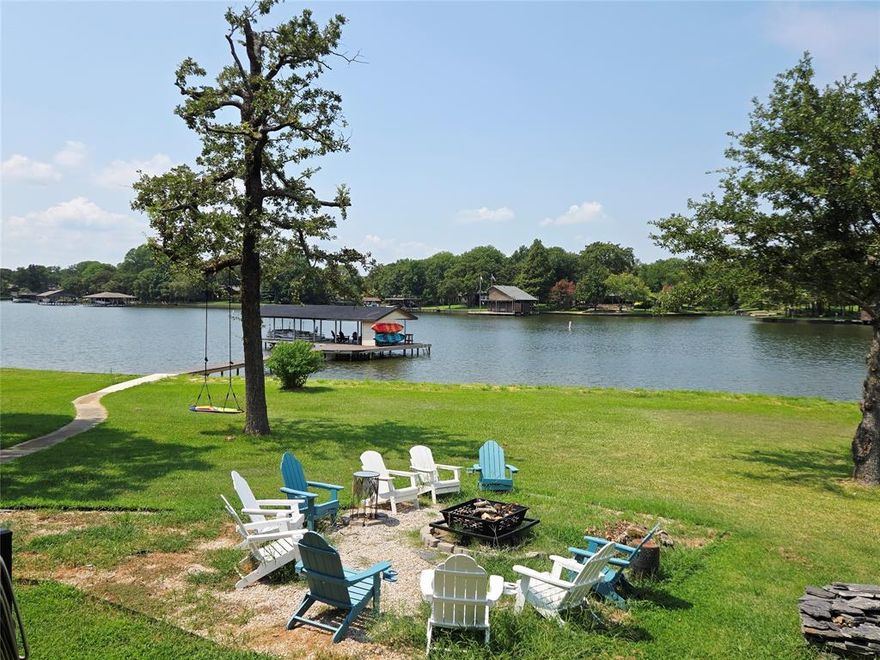 This stunning Cedar Branch Park waterfront home is on a .55-acre lot with 318 feet of waterfront. It features 4 bedrooms, 3 full baths, and 2 living areas. Recent updates include a NEW HVAC system, appliances, flooring, and remodeled bathrooms. The boat dock has a NEW lift motor and belt, suitable for both ski and pontoon boats.
New Seawall panels replaced, New plumbing installed. City water and Sewer. A spacious party deck is ideal for waterfront relaxation. The second deck can be an outdoor workspace with glass-view garage doors facing the waterfront. Most bedroom furniture is included, and short-term rentals are allowed with POA approval under new ownership. The solar panels are fully paid off and work great all year round, no warranty. EV Charging plug in the garage.