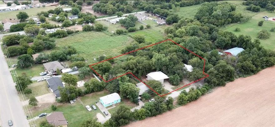 Very modern and efficient home built with energy saving features. Large open kitchen including 48” Viking stove. Well insulated. on-demand natural gas water heater and HVAC is supplied via efficient Minisplit heat pumps to keep you comfortable all year round. Backup heat is also installed via natural gas wall infrared heater. LED dimmable lights and big windows make it a bright happy home. Tucked away in the south end of a country feel street with quiet neighbors and lots of trees make this a peaceful environment. underground safe room-storm shelter. The hot tub is another feature adding to the relaxing environment on this property. Parking for several vehicles (including RV Parking) is available under 1200 sq ft of car port or in the detached garage. The 1400 sq ft garage Shop is also insulated with spray foam and cooled-heated via Mini split system. Water, Sewer, Natural Gas, Electric is also run to Garage shop. All of this hidden away on .93 acres country feel