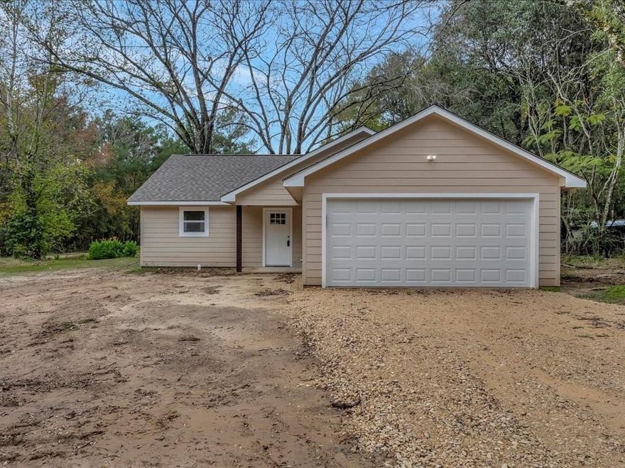 This new construction home is ready for the holidays! Open concept living area, kitchen with breakfast bar and stainless appliances, granite countertops. Pantry storage. Utility room. Double attached garage. Large lot.