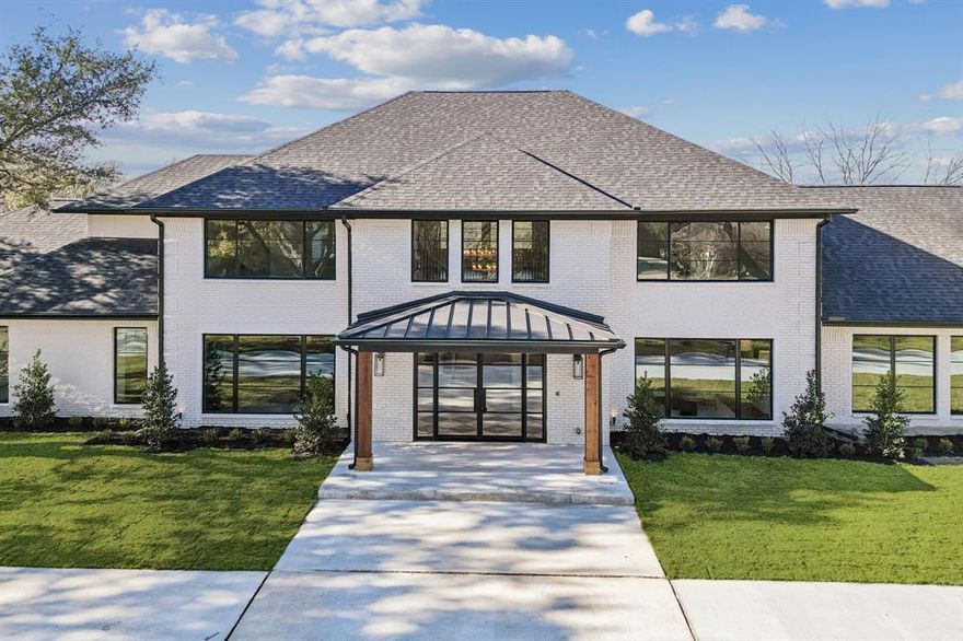 Set on nearly 2.5 acres and transformed through a complete high-end redesign, this 8,097 sq ft estate delivers a rare blend of modern luxury, architectural sophistication, and exceptional quality upgrades within Lovejoy ISD.

This expansive 5-bedroom residence offers 6 full bathrooms and 2 half bathrooms. A grand iron front door welcomes you into vaulted ceilings anchored by two beautifully appointed living rooms, each featuring its own fireplace. The main level also includes a dedicated office, a formal dining room, and a luxurious primary suite designed as a private retreat. Here, you’ll find a fireplace, an infrared sauna, standalone soaking tub, towel warmers, dual vanities, and an oversized custom closet with an island and its own laundry room.

The kitchen is a standout space featuring white oak cabinetry, quartz countertops, under-cabinet lighting, and a butler's pantry with generous prep areas, creating an ideal setting for both everyday meals and gatherings. A fully finished basement offers additional living space with a bar area and full bathroom.

Upstairs, a large open family room provides a versatile gathering space, accompanied by three ensuite bedrooms with walk-in closets, a half bathroom, and a dedicated media room.

Outdoor living is elevated by a gated pool and a charming cedar pergola, set within vast, beautifully landscaped grounds. The property also includes a spacious 4-car garage with an epoxy floor, offering both convenience and impressive curb appeal.

Conveniently located off Stacy Road near Highway 75, and just minutes from The Villages of Allen, this estate enjoys easy access to a wide array of shopping, dining, and entertainment.