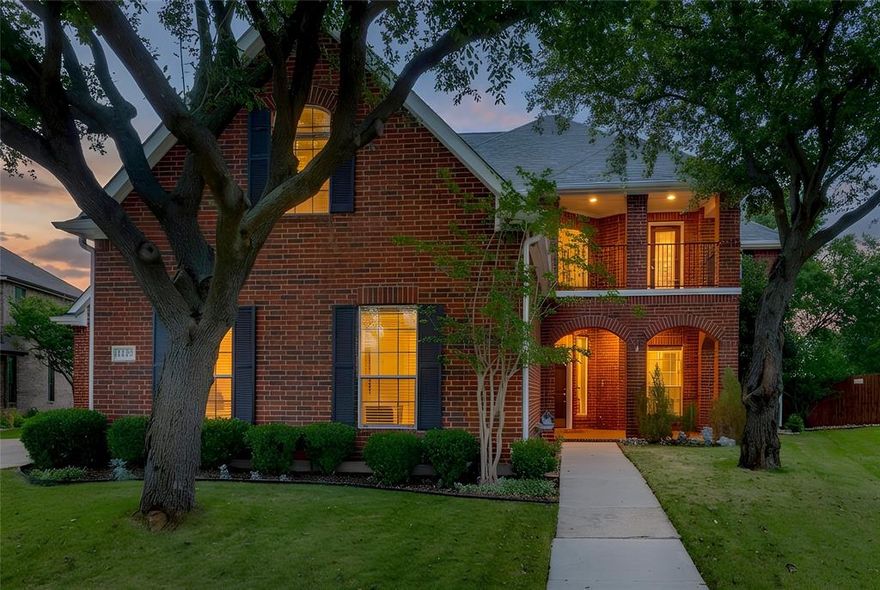 This original owner home is situated on a premier cul de sac lot in the Heritage Addition, just two blocks from the clubhouse and tennis courts. It features a versatile floor plan with 4 or 5 bedrooms and 4 living areas, allowing for various arrangements. The abundance of windows fills the home with natural light.The downstairs is adorned with beautiful wood and tile flooring, complemented by a stunning staircase featuring iron spindles. The spacious primary bedroom, also located on the main level, includes an ensuite bath with a jetted tub and a walk-in closet. The optional bedroom downstairs has double doors to the backyard, also makes a great office. All full bathrooms are updated with  shower tile and granite countertops.The kitchen is equipped with upgraded appliances, including a cooktop with a downdraft in the island, as well as plenty of upper and lower cabinets for storage. Upstairs, you will find 3 additional bedrooms, one of which has a lovely attached balcony. There are also 2 full baths, a study area with cabinets, a large media room, and an expansive game room that overlooks the beautiful backyard and the downstairs family room, which features a gas log fireplace.The grassy backyard is lined with live oak trees, providing a serene outdoor space. Three car parking in 2 separate garages. The front offers views of the large greenbalt space with jogging trail leading to creek and ponds.
