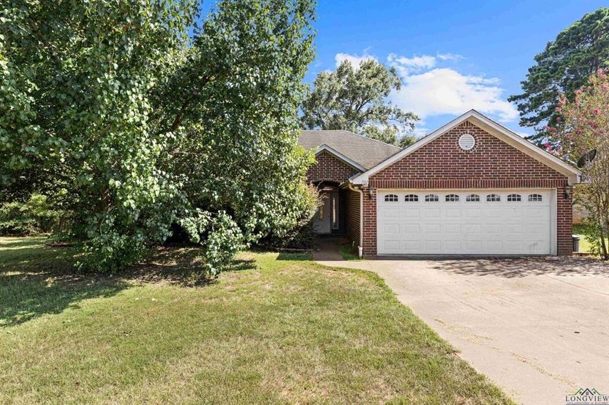 Welcome to 702 Cheryl Drive, nestled in the highly sought-after Spring Hill ISD. This inviting 3-bedroom, 2-bath home is thoughtfully designed for everyday comfort and effortless living. Inside, you'll find an open-concept layout that seamlessly connects the spacious kitchen to the main living area, ideal for both relaxing evenings and casual gatherings. A split-bedroom arrangement provides added privacy, while the family room, anchored by a cozy fireplace and framed by large windows, creates a warm and welcoming atmosphere.

Step outside to a generous covered back porch overlooking a peaceful backyard.  Perfect for morning coffee or winding down at sunset. Fresh, neutral interiors throughout make it easy to envision your personal style in every space. Whether you're starting fresh or settling in for the long haul, 702 Cheryl is the perfect place to call home.