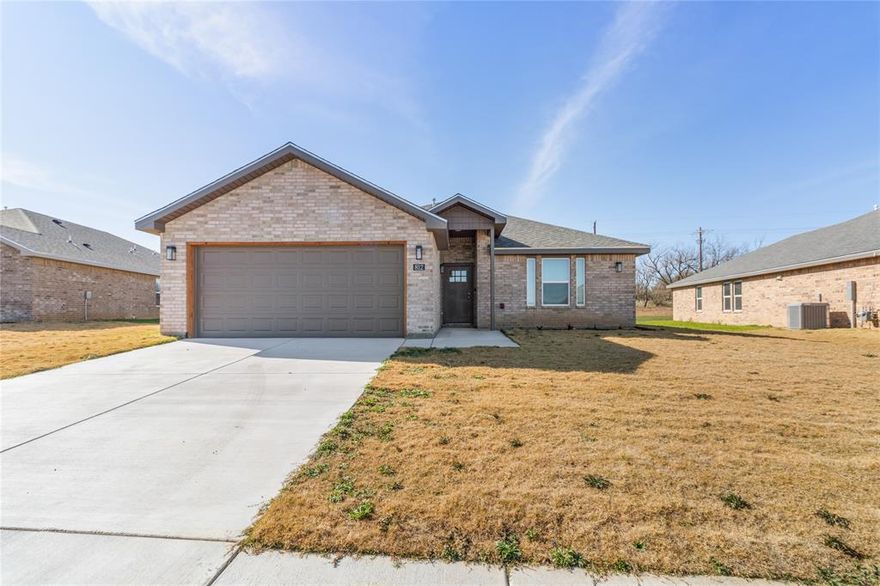 Beautiful new construction in Coleman’s first subdivision—The Triangle! Located on the east side of town off the Hwy 84 Bypass, this community offers fiber-optic internet, ideal for those who work from home. Entrance at Guadalupe & Third St. Built by Friday Building Corporation of Midland.

This well-crafted 3 bedroom, 2 bathroom brick home with an attached 2-car garage features 1,762 sq ft of thoughtfully designed living space. The open layout includes a spacious living room, dining area, and a stylish kitchen with granite countertops, abundant cabinetry, an eating bar, roomy pantry, and stainless appliances. The sequestered primary suite offers dual sinks, his-and-her closets, a soaking tub, and a walk-in shower. Two guest bedrooms, an inside utility room, and a covered north-facing patio complete the design.

Homes include a builder’s warranty, with upgrade options available during construction. Standard features include central HVAC, gas water heater, gas oven, smoke CO detectors, faux wood vinyl shutters in bedrooms, smart-home prewiring, LED lighting, designer mirrors, and luxury vinyl flooring throughout.

Excellent location just minutes from downtown Coleman. The city sits in the heart of Texas with easy three-hour access to DFW, Austin, San Antonio, Midland-Odessa, and Lubbock—ideal for families, retirees, or investors in this thriving community.

Builder Incentive for the first 9 homes: front-yard sod with tree and shrubs, grass seed in the backyard, plus automatic sprinkler systems in both front and back yards. Don’t miss your opportunity to own a beautiful home in The Triangle—Coleman’s first new subdivision in decades!