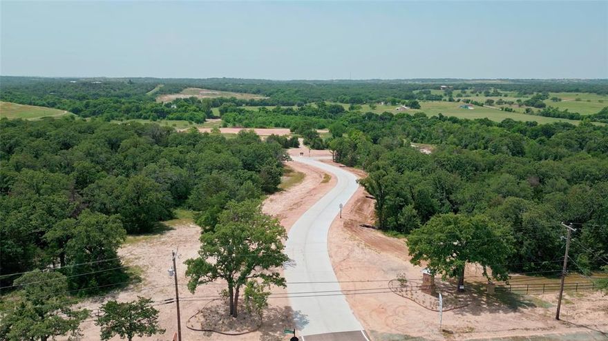 Discover serenity and space on this expansive 2.002-acre homesite nestled within the picturesque Encanto Estates in Azle, Texas. Situated on a tranquil cul-de-sac, this parcel offers the perfect blend of privacy and community charm. Ideal for building your dream home, it presents a canvas where luxury meets nature.

Embrace the opportunity to customize your oasis, complete with panoramic views and a peaceful ambiance. As an added feature, the property includes provisions for a water well installation, ensuring self-sufficiency and flexibility in your residential plans.

Don't miss your chance to own a piece of Encanto Estates, where modern living meets natural beauty. Contact us today to explore the endless possibilities awaiting you on this exceptional homesite.