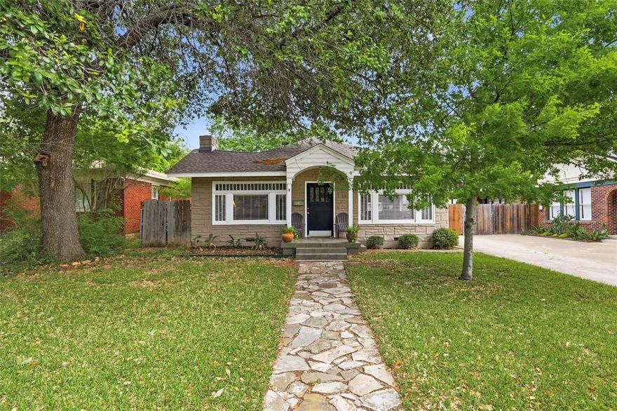 Nestled beneath mature trees in the highly sought-after Mistletoe Heights neighborhood, this charming home blends timeless character with an unbeatable Fort Worth lifestyle. From the inviting curb appeal to the thoughtful layout, every detail reflects comfort, warmth, and everyday livability. Inside, natural light fills the home through expansive windows, highlighting original hardwood floors and a welcoming living space anchored by a cozy fireplace. The kitchen offers both style and function with granite countertops, stainless steel appliances, a gas cooktop, and a breakfast bar, all opening seamlessly into your dining room. Your kitchen sink is set beneath a window bringing in soft natural light and a connection to the outdoors. The dining space is surrounded by a wall of windows, creating a bright and inviting setting for gatherings. The primary suite offers a comfortable and spacious retreat with room for a sitting area and direct access to your backyard, including an ensuite bath featuring dual vanities, a soaking tub, and separate shower. Step outside to a private backyard complete with a expansive deck and lush green space—perfect for relaxing or entertaining. A detached garage adds convenience, additional storage along with a workshop! From here, the best of Fort Worth is right at your fingertips. You’re just minutes from downtown Fort Worth, University Park Village, and both the Magnolia and Medical Districts, and within walking distance to the Trinity Trails for quick access to local shops and dining.