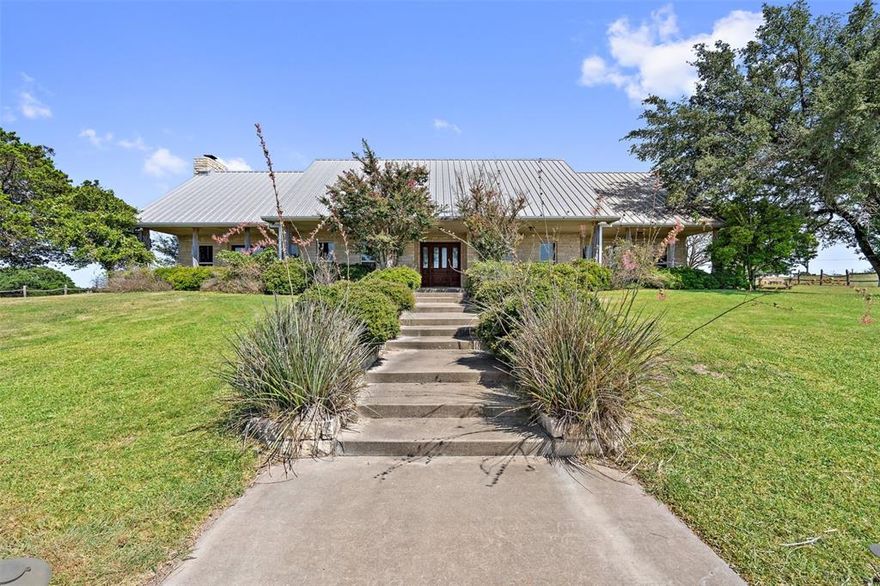 Watch the sunset and enjoy the peace and tranquility this retreat offers! Beautiful rock home with covered porches and lots of room for family and friends. This home has 3 bedrooms, 2.5 baths, 2 living areas, formal dining area, breakfast area, large kitchen with tons of cabinets and storage, large utility room and a 2 car garage. Ranch is being used for cattle grazing and has an abundance of deer. Ranch has not been leased for hunting in many years! There is an older doublewide down the hill used for family and guests and also, a singlewide further down the road on the ranch that is rented to a neighboring ranch hand. Beautiful ranch with a phenomenal hill country view and rich with history.