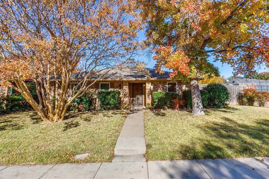 Welcome home to this quiet, cozy 2-bedroom, 2-bath gem, nestled in a small, three street neighborhood tucked into a peaceful pocket on a desirable corner lot. Step inside to a spacious living room with a classic brick fireplace—perfect for peaceful evenings. The large primary suite is a true retreat, featuring two closets and a generous ensuite with a walk-in shower that adds a touch of everyday luxury. The second bedroom, on the opposite side of the home, is generously sized with a roomy closet. Host dinners in the formal dining area or enjoy casual meals in the kitchen’s breakfast nook with a charming bay window. The kitchen features granite countertops and a picturesque window overlooking the backyard. French doors open to a generous screened-in porch—your ideal spot for morning coffee or evening relaxation. The beautifully landscaped backyard is fenced with board-on-board privacy, and has a peach tree that produces a bounty of fresh peaches each year.  Washer, dryer, and refrigerator all convey, making move-in effortless. Buyer to purchase survey.
