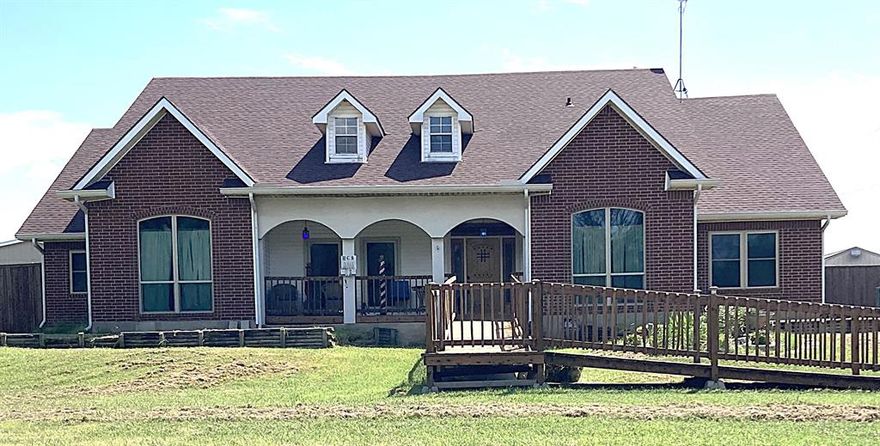 Charming brick home situated on more than half an acre with paved road frontage, offering the perfect blend of privacy and country living. This spacious residence features 4 bedrooms and 3 full bathrooms, each thoughtfully designed with walk-in showers for added convenience and style. The home is equipped with solar panels, providing eco-friendly energy and monthly credits from the electric provider, helping to reduce your utility costs. New roof installed June of this year.  Energy efficient, triple pane windows.  Enjoy peaceful moments in the privacy-fenced backyard—ideal for relaxing, entertaining, or outdoor activities.  Experience quiet, serene living while still being close to local amenities. Don’t miss out on this beautiful, move-in-ready home!