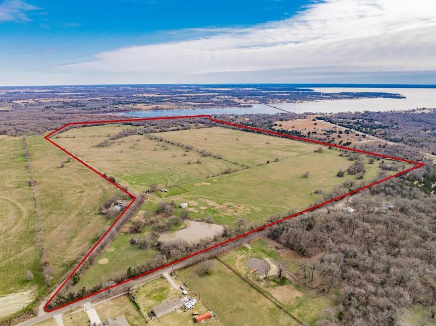 ONCE IN A LIFETIME OPPORTUNITY! 162 ACRES BACKING UP TO A COVE ON BEAUTIFUL LAKE TAWAKONI! Properties like this are extremely unique and rarely come up for sale - a true unicorn. This beautiful, active cattle ranch has been in the family longer than Lake Tawakoni itself and is unlike anything on the market today. Almost 2500' frontage on hard surface County Road 1605. The property is completely fenced and cross-fenced, and features four ponds and two barns. There are two water meters and an old septic on site. The possibilities are endless. It could be the ultimate family ranch, or a crown jewel to develop. Call or text me to see this one ASAP. Come see this one before it's gone!