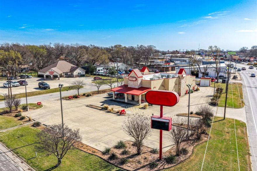 Pleased to present 1014 W Moore Ave which offers a ±3,377 SF second-generation restaurant opportunity on ±0.71 acres with existing drive-thru infrastructure and exposure to approximately 33,000 vehicles per day along the Hwy 80 corridor in Terrell. The building is fully built out for restaurant use and includes a commercial kitchen with exhaust hood and fire suppression system, stainless cookline configuration, walk-in refrigeration, beverage service infrastructure, and a finished dining layout. Existing mechanical, electrical, plumbing, and kitchen systems allow operators to avoid costly six-figure buildout expenses typically associated with new restaurant construction. The conversion-ready layout and installed infrastructure create a plug-and-play opportunity for QSR, fast casual, or other restaurant concepts seeking a faster path to opening, reduced tenant improvement costs, and an accelerated timeline to revenue generation within Terrell’s growing Hwy 80 commercial corridor.