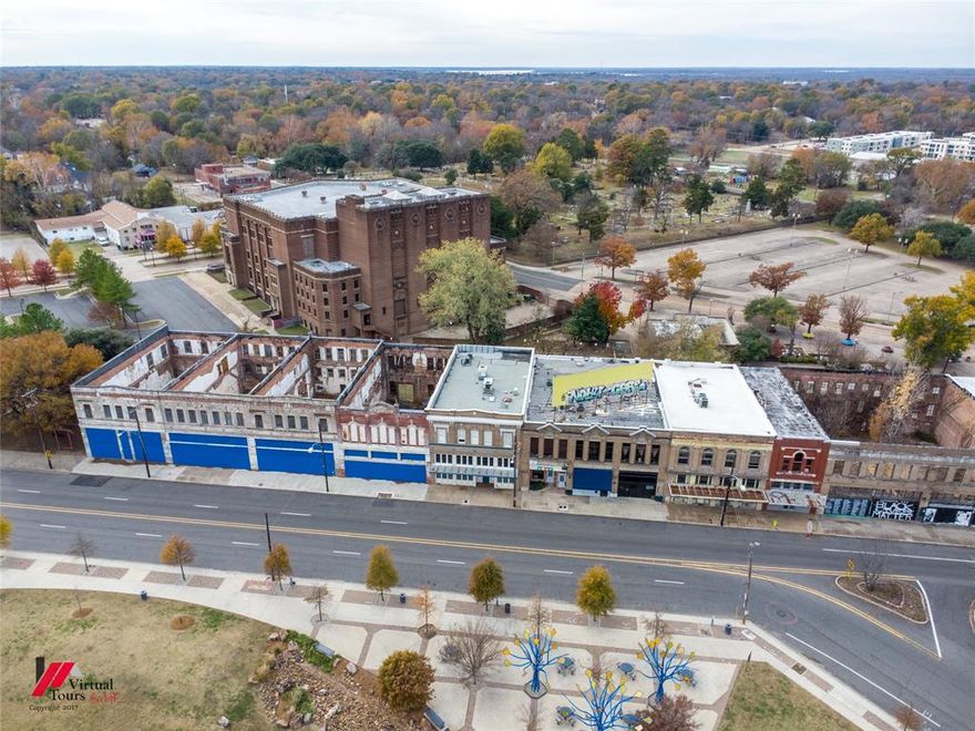 Investment opportunity in the Shreveport Common nestled between the Municipal Auditorium and Caddo Common Park! Once the home of New York Furniture is now ready for someone with a new vision. The property features lots 4, 5, 6, & 7, the shell building is approximately 12,000+ sf plus green space.  Historical Tax Credit Options & Opportunity Zone!!