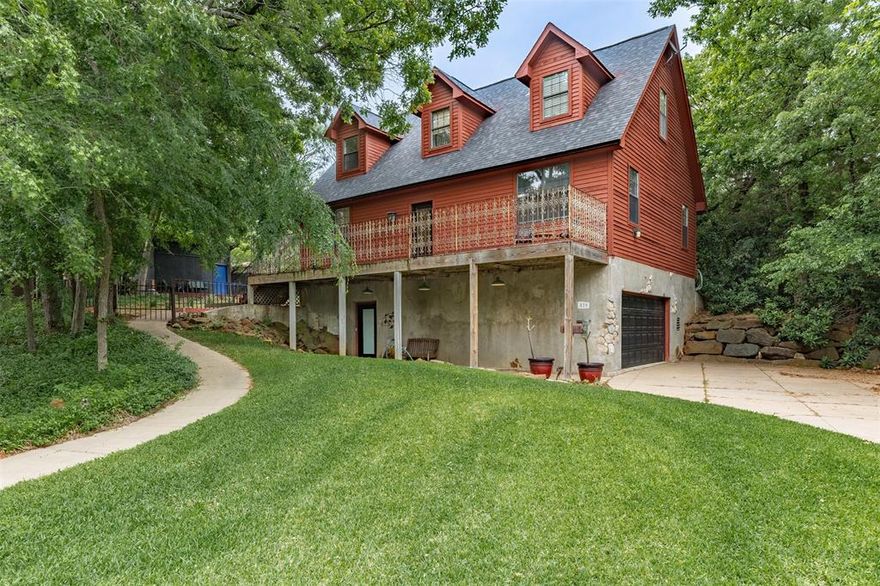 Located on a wooded area in central Denison, this tree house like home is totally unique.  Enter the lower level to the garage, spacious laundry room, bedroom and ensuite bath, or take the winding sidewalk to the main level entry.  Primary bedroom, bath, two living areas and kitchen are located on the main level, while two bedrooms and a bath are located on the third level.  The backyard is truly an oasis, totally secluded from neighbors, with a patio lounging area, storage building and walkway to a covered boat or RV parking area, with access from an abandoned alleyway. HVAC is 2 years old, roof 4 years, water heater replaced and outside repainted in 2025, sprinkler system controller recently replaced, and remodeled inside includes replacing canned lights with LED's, added a fireplace to the living area and remodeled the bathrooms.  Washer, dryer and kitchen refrigerator are negotiable.  Make an appointment to see this one today!