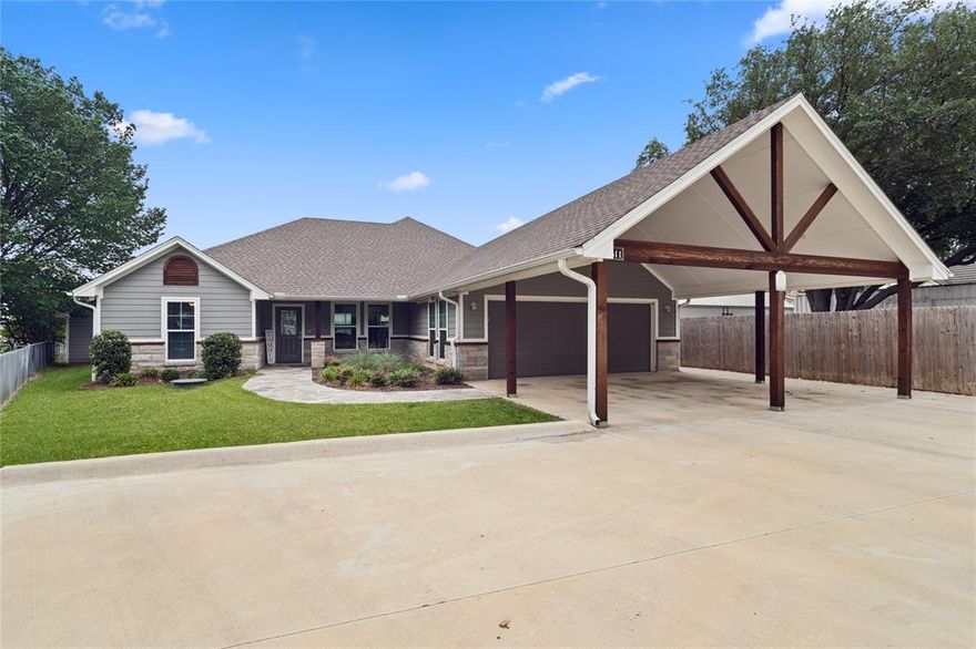 Built in 2022 and perfectly positioned on the main body of Lake Granbury, this stunning 3-bedroom, 2-bath lake house offers the ultimate blend of modern comfort and waterfront living. Designed for both relaxation and entertaining, the home features a beautifully appointed kitchen with granite countertops, stainless steel appliances, and abundant cabinetry for all your storage needs. Natural light pours into the home through an abundance of windows, creating a bright and inviting atmosphere throughout. Enjoy year-round lake views from the sunroom, complete with central air and heat with expansive glass sliding doors that bring the outdoors in. Step outside to your private outdoor oasis, thoughtfully designed with a rock patio, fire pit, and a hot tub—perfect for unwinding after a day on the water. The fully equipped outdoor kitchen with appliances makes entertaining effortless while enjoying the lakefront setting. The oversized dock is a standout feature, equipped with two boat lifts, two jet ski lifts, a storage closet, and plenty of space to lounge or entertain. The property also includes a separate storage building and ample parking for guests or recreational vehicles. As an added bonus, the 2022 Master Craft Boat and Sea-Doos are included, making this a true turnkey lakefront retreat. Conveniently located on the Acton side of Granbury making it just a short drive from Fort Worth and Cleburne. This is livin and you won't want to miss it!