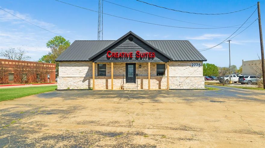 Prime Commercial Opportunity in High-Traffic Location! Positioned in a highly visible, high-traffic area, this versatile commercial property offers over 3,200 square feet of flexible space on a generous 0.64-acre lot. Currently configured with multiple private suites, the layout is ideal for income-producing leases or can easily be converted to 100% owner-occupied use. Built with pier and beam construction, the property provides exceptional flexibility—allowing for reconfiguration, expansion, or customization to suit a wide range of business needs. Whether you’re an investor seeking rental income or a business owner looking for a strategic location, the possibilities here are endless.
Conveniently accessible from Loop 286 as well as rear entry, the property features ample parking for clients, tenants, and staff. The expansive lot also offers room for future growth, additional structures, or even a complete redevelopment to fit your vision.
This is a rare opportunity to secure a highly adaptable property in a prime location with excellent visibility and access. Some photos have been virtually staged.