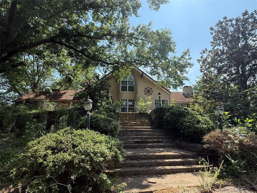 HUD Owned Home FHA Case# 511-038942 Sold AS-IS. MAJOR PRICE IMPROVEMENT AND NOW AVAILABLE FOR ALL BIDDERS. COME LOOK OR TAKE A SECOND LOOK BEFORE IT IS GONE! Custom Built and one of a kind! This luxury home sits on 15 acres of land with a beautiful view of a large pond. Nice location sitting on a hill with a great view of the countryside.  Large barn with additional living quarters, in-ground pool and more. The interior offers large rooms, grand open living room with vaulted ceilings and rock fireplace and lots of natural light. Second formal living and dining area with fireplace. This home has so much to offer and is a must see. Come take a look today before it is gone.  Purchase this home with as little as $100 down when utilizing the HUD FHA Sales Incentive.