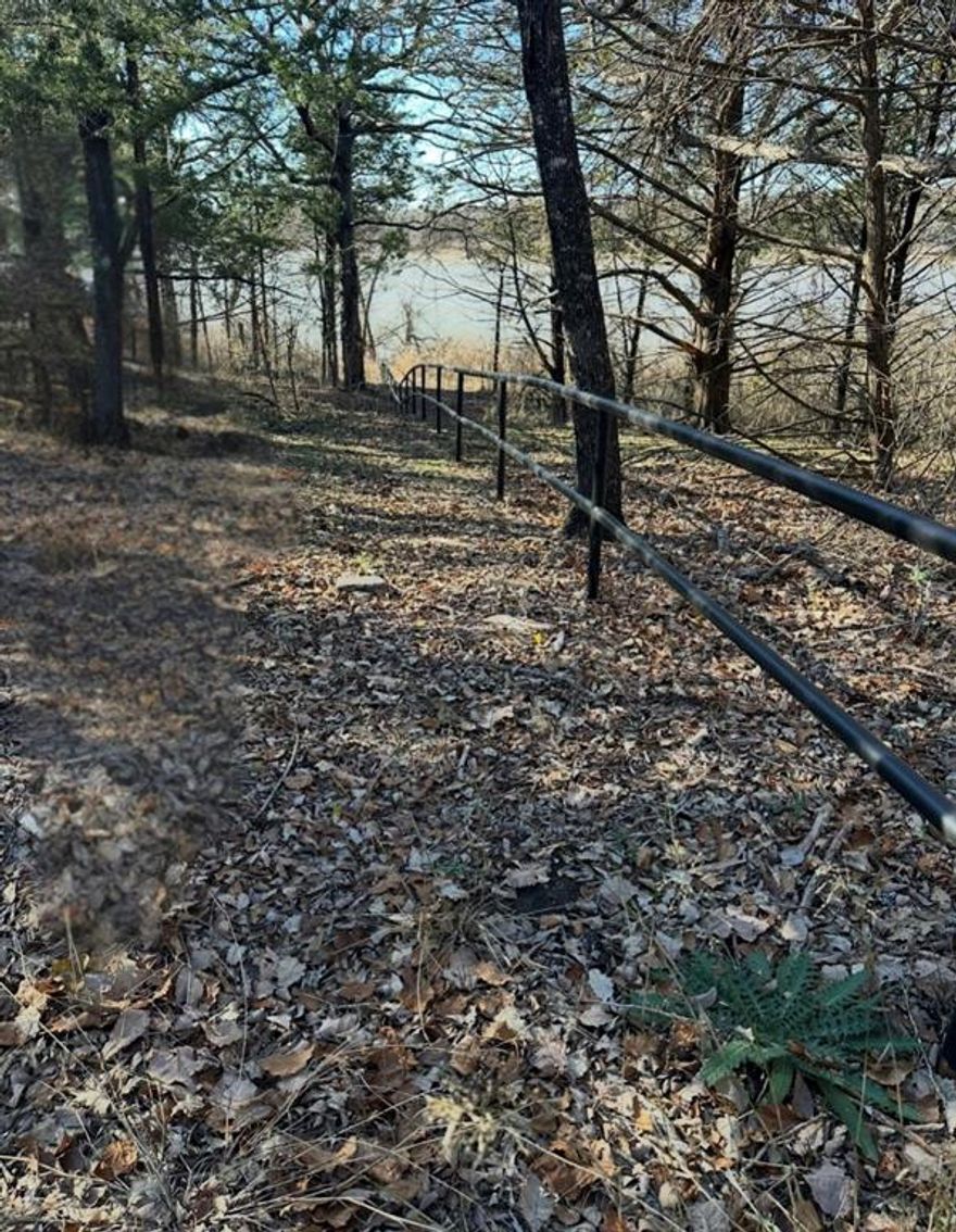 Rock Creek Resort is a secluded treasure in North Texas, offering a perfect blend of tranquility and upscale amenities. This 0.341-acre lot backs up to protected Army Corps land, ensuring uninterrupted natural views with no future development behind you. Located in The Palisades 2 section, it’s within walking distance of Lake Texoma, making it an ideal spot to build your dream home.

Rock Creek provides an array of top-tier amenities, including a championship Jack Nicklaus-designed golf course, a resort-style pool, tennis courts, a modern fitness center, and a marina with available boat slips. The sophisticated Clubhouse offers fine dining, completing the luxurious lifestyle that makes Rock Creek an exceptional place to call home.