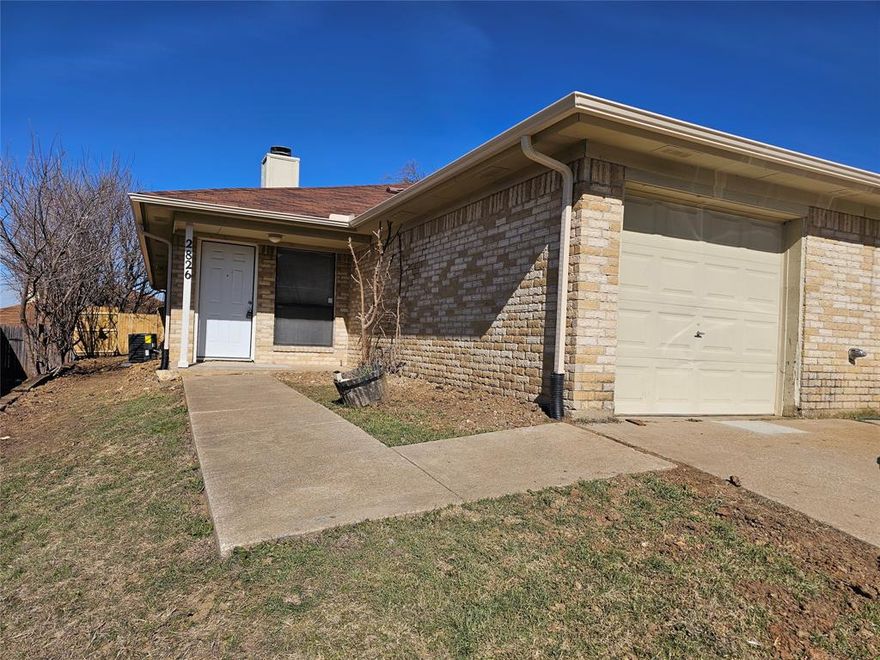 RECENTLY UPDATED 3 bedroom, 2 bath duplex with one car garage and fenced backyard. New paint, new luxury plank vinyl flooring and all new stainless steel appliances. Brick wood burning fireplace. Move-in ready!