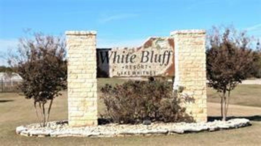 Make your memories in wonderful White Bluff Resort along Lake Whitney.  The best of both worlds - a golf course lot overlooking the 12th hole of the Old Course and a view of Lake Whitney. White Bluff Resort includes four swimming pools, marina, RV camping, tennis and pickleball courts, two championship golf courses, fitness center, conference center, and rental condos nestled in wooded terrain filled with deer, turkeys, and other wildlife. After a day on the lake or the golf course relax for a meal or beverage at Mulligans Grill, the Lighthouse Pub, or the 19th Hole. Purchase includes 32 rounds of golf per year.  $300 per yr special assessment for the next two years.  Lot survey is available.