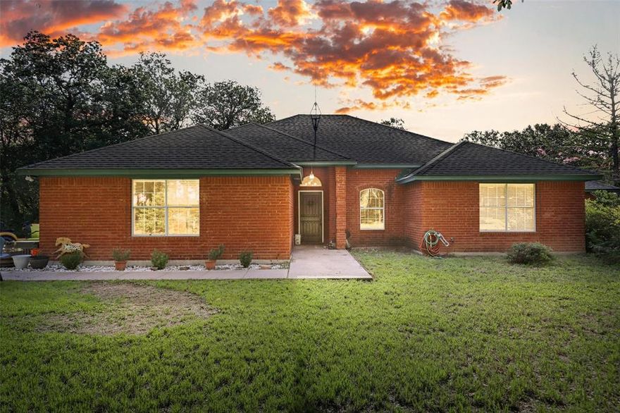 Escape to the country w beautifully maintained home on five scenic acres in Brock ISD. Property perfectly blends charm of rural living w the convenience of modern updates. Step inside to find open-concept layout filled w natural light, strand-woven bamboo and ceramic tile flooring, elegant tray ceilings and decorative touches. Heart of home is spacious living room; anchored by a cozy brick, wood-burning fireplace - perfect for gathering on cool evenings. Adjoining kitchen designed w both style and function in mind; featuring painted cabinetry w glass-front accents, stainless steel appliances, durable Corian countertops and generous pantry. Dining area overlooks backyard, ideal for everyday meals or hosting family and friends. Home’s thoughtful design includes 2 primary suites - one w oversized layout; complete w jacuzzi tub, separate shower and walk-in closet; second tucked away on opposite side of home, ideal for multi-generational living or guests. Additional highlights include second living area for flexibility, walk-in utility room. Outside, mature shade trees create peaceful backdrop. Five-acre property also features wire fencing, storage sheds and open space to create your own country retreat. Whether you dream of raising animals, gardening or simply enjoying wide-open spaces; this property delivers. Lipan is known for its small-town charm, strong community spirit and proximity to outdoor recreation. You’ll be just minutes from the Brazos River; offering fishing, kayaking and weekend fun. Less than an hour from downtown Fort Worth, making it easy to commute or access city amenities. Nearby Weatherford and Granbury provide shopping, dining and healthcare. This home delivers perfect blend of tranquility and convenience. If you’ve been looking for a home that offers privacy, space and the lifestyle of country living while still being connected to everything you need; this property is a must-see.