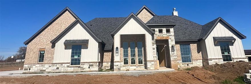 Make this Malibu Homes new construction, 4 bedroom and a study, 2.5 bathroom, 3 car garage on room to play 2
acre corner lot with an open concept and split floor plan your home. White, crisp kitchen with Shaker cabinets features SS appliances,
granite countertops and a large island for entertaining. This pantry is something to see- - extremely oversized for ALL the storage. Primary closet conveniently connects to the utility room. There is a half bath and mud bench area off the garage entrance. Fireplace,  cathedral ceilings with stained beams, and double doors that open to the back patio round off the living room. Smart thermostat, along with irrigated, sodded and landscaped yard come standard. Boyd ISD and easy access to both HWY 114 and to
HWY 287. **Up to $10K lender incentive**