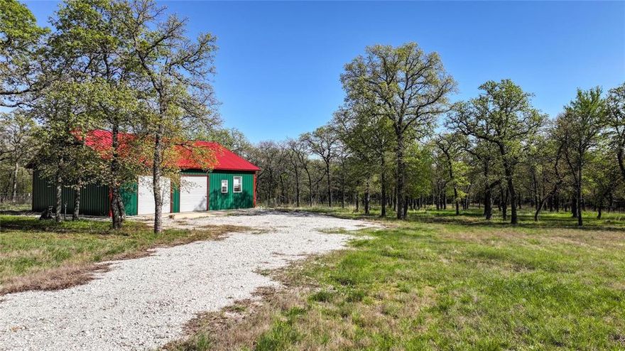 FURNISHED LIVING QUARTERS inside 30x40 barn that allows the perfect location to live while you build your dream home or perfect country getaway from the hustle and bustle.  Shop includes 220 volt electric. 5 acres of serene paradise entirely fenced is awaiting your arrival in the exclusive Silver Lakes Ranch with mature hardwoods abound and beautiful gated entry.  Short drive to Highway 287 and amenities include access to private clubhouse, pool and private lake.  Short drive to Top O The Lake Golf Course and minutes from Amon G Carter. Nestled within the picturesque landscape of a rolling hills subdivision, this pristine 5-acre parcel offers an unparalleled opportunity to build your dream oasis. Apartment includes all amenities and furnishings needed to call it home!  With Amon Carter Lake just a stone's throw away, you'll have the privilege of enjoying leisurely days by the water's edge, indulging in fishing, boating, or simply basking in the tranquility of nature. The community clubhouse offers a welcoming space for gatherings as well as a meeting room. The neighborhood also features a fitness center, pool, pavilion and playground onsite, providing you with the opportunity to forge lasting connections with neighbors and friends. For those seeking adventure on the open road, RV and boat storage are also available directly in the community. Lastly, take advantage of the two additional private lakes within Silver Lakes, Lake Horizon and Scout Lake!  The majority of contents convey with the sell of property, including lawn equipment.
