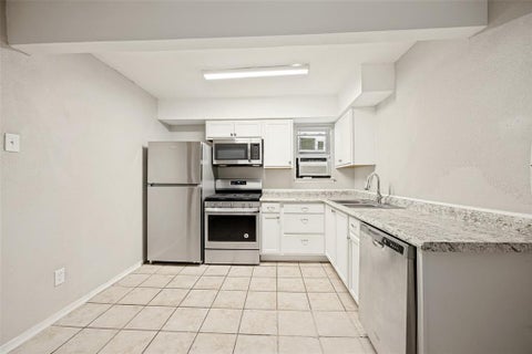 Photo of 1001 W Elm Street #204, Denison, TX 75020 (MLS # 21391448)