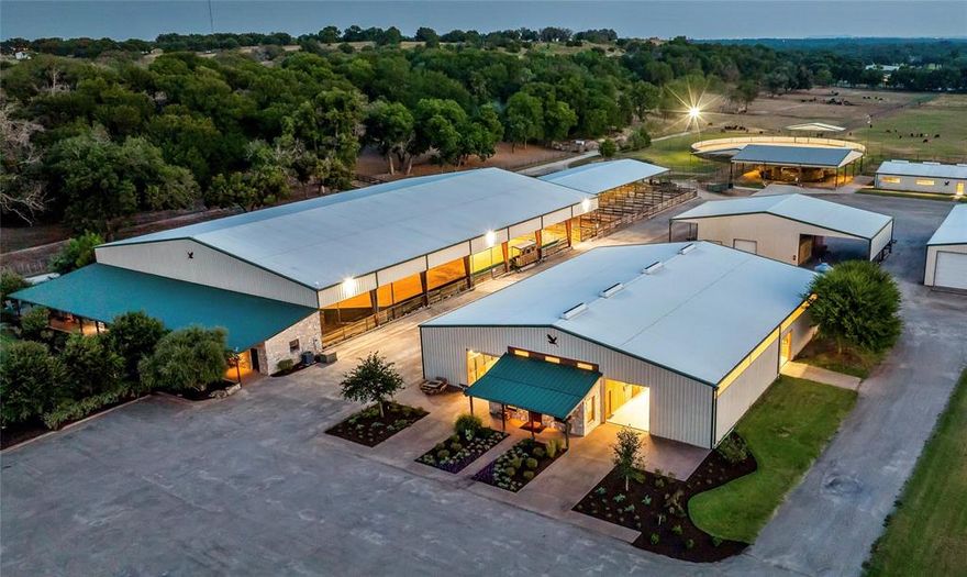 Introducing The Blue Heron Ranch. This well designed private ranch consist of just over 59 acres along the west side of Silverado on the Brazos. While its placement is inside the gated community of the popular development the property actually sits outside the restrictive covenants of the HOA. 

The facility is complete with twenty one tilt wall stalls, double tack room and office in the main show barn, five 20ft x 20ft stalls in the secondary barn, eleven oversized covered runs, 120ft x 150ft covered shell over the riding arena, 140ft outdoor lighten round pen, covered Priefert panel walker, four apartments, two bay drive through bus barn, commodity barn, paved driveway, double gated entrance, bronc pen, cattle pens, loading dock, and multiple top rail fenced pastures with loafing sheds.

Property owner can also layout a main home on the elevated partially treed lot on the east side of the facility with more than ample room for privacy and scenic views.