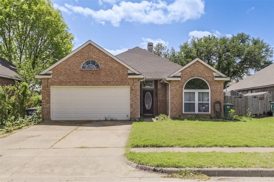 Charming 3 Bed, 2 Bath Home in Fort Worth! This inviting single-story residence offers comfortable living in Fort Worth. The spacious living room features a beautiful decorative wood-burning fireplace. The kitchen provides ample counter, cabinet, and drawer space, while the dining room is filled with natural light from the bay window. The primary suite includes an ensuite bath with dual sinks, a large garden tub, separate shower, and a generous walk-in closet. Two additional spacious guest bedrooms offer plenty of room. Additionally, the roof, HVAC, water heater, windows and siding were all replaced within the last 5 years. Located in Crowley ISD and convenient to major highways, shopping, and restaurants. This home delivers practical living with thoughtful features throughout.