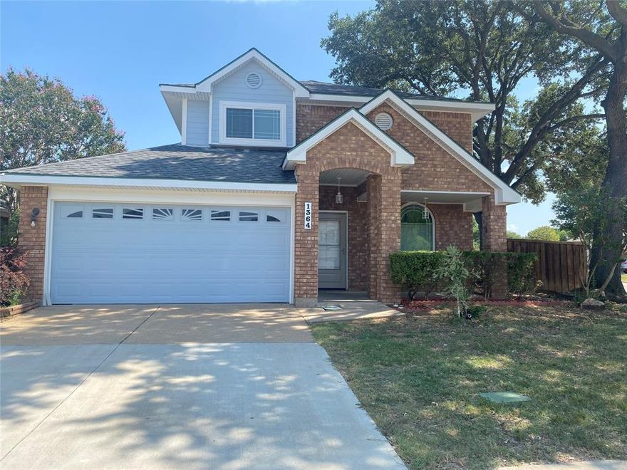 **October Move In Special-$200 Off 1st Month Rent** Meticulously maintained 4 bedroom, 2.1 bath, 2 car garage home located on corner lot is ready for immediate occupancy. Updates include new laminate wood flooring, kitchen tile, granite countertops, fresh paint, new light fixtures, and all new windows for energy efficiency. Generous sized secondary bedrooms are split from primary bedroom which is located on first floor. Primary ensuite includes a remodeled bath with dual vanities, stand alone shower, separate tub and a skylight for lots of natural light. Eat in kitchen offers plenty of cabinet space, new counters, stainless refrigerator, gas stove and lots of light from big picture window with bench sitting while overlooking the living room with WB fireplace. Pet allowed with restrictions.
