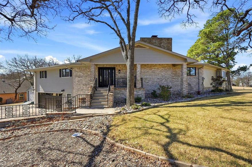 Beautifully updated golf course home situated on two lots with scenic views and exceptional flexibility. This open-concept floor plan features LVP flooring throughout the main living areas, seamlessly connecting the living, dining, and kitchen spaces. The spacious living room offers a cozy wood-burning fireplace and built-ins, perfect for relaxing or entertaining.

The updated kitchen includes granite countertops, abundant cabinetry, and ample prep space. The primary suite overlooks the golf course and features an en-suite bath with walk-in closets, garden tub, separate shower, and direct access to the utility room. A secondary bedroom also includes a private en-suite bath. An additional main-level flex space is ideal for a home office, hobby room, or additional sitting area.

Enjoy outdoor living on the large screened porch overlooking the course. Storage space is available beneath the deck. The lower level offers additional flex space that can serve as a third bedroom, game room, or second living area.

A spacious garage provides room for a workshop, and the 12’ x 18’ shed is perfect for storage, a workshop, or golf cart parking. Multiple outdoor deck areas offer great spaces for entertaining or enjoying the peaceful surroundings near Lake Kiowa